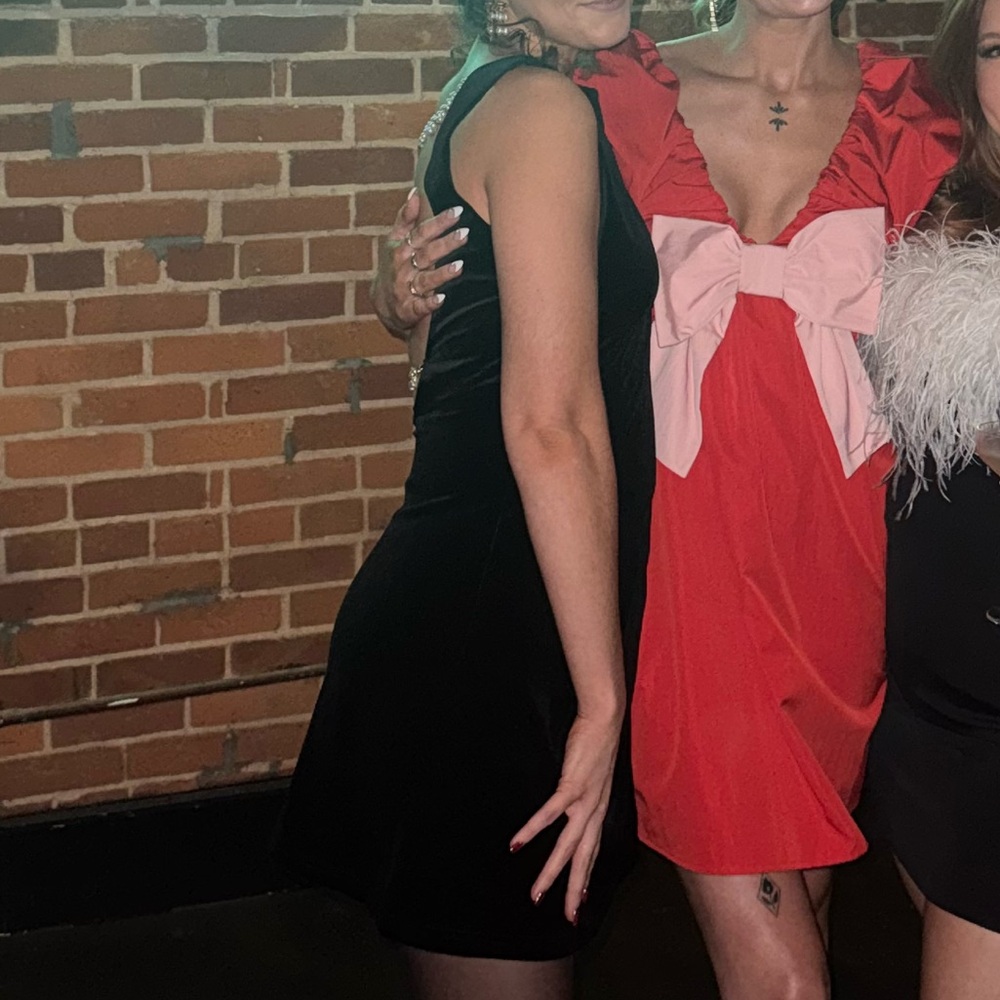 Red holiday dress with pink bow